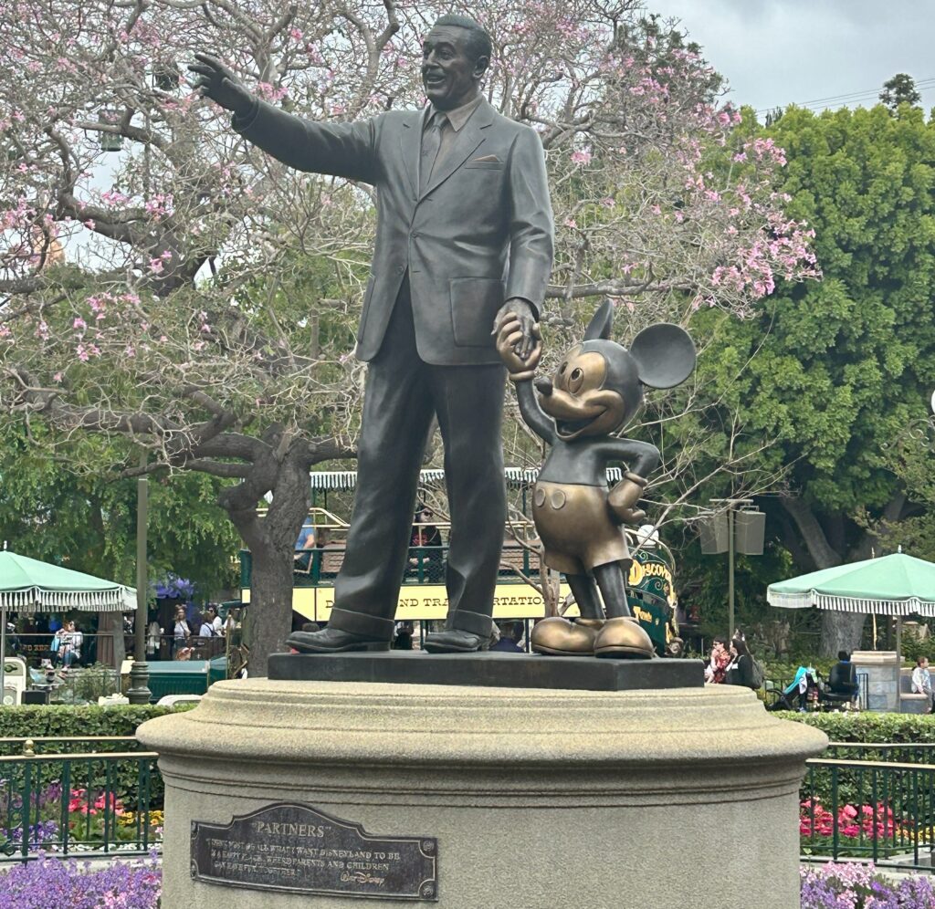 Walt Disney and Mickey Mouse statue at Disneyland,